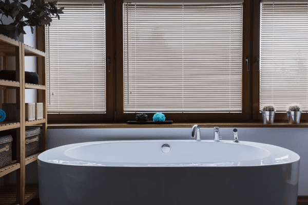 A luxurious bathroom featuring sleek and modern window blinds, perfect for privacy and style in 2025. The best blinds in Dubai for an elegant and affordable upgrade.