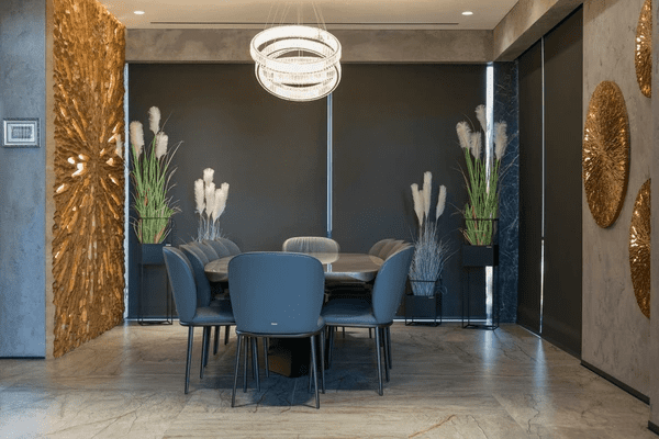 Elegant blackout roller blinds in a luxurious Dubai apartment dining area, providing privacy, style, and modern sophistication for 2025 home décor trends.
