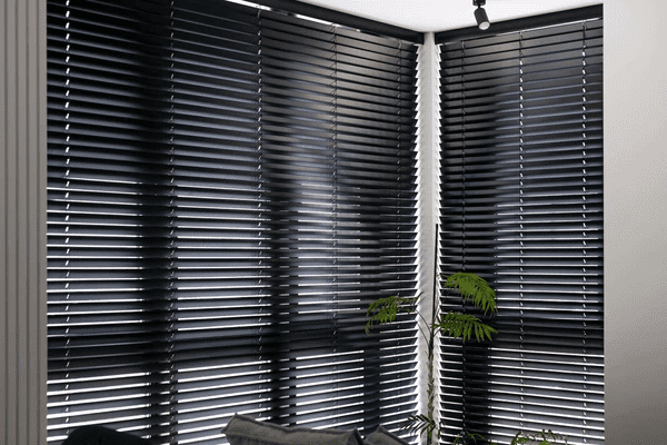 Sleek black venetian blinds offering a modern and sophisticated look, perfect for Dubai homes in 2025.