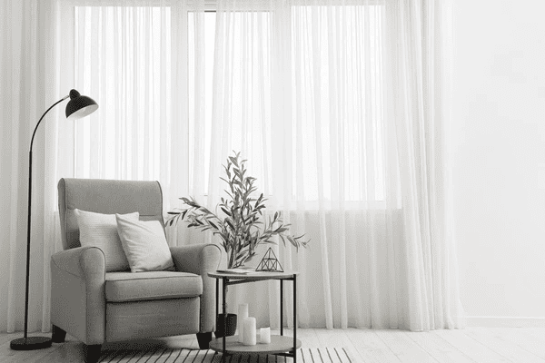 A stylish living space in Dubai featuring modern, sleek, and trendy curtains, proving why curtains are the top-rated choice over blinds in 2025 for elegance and functionality.