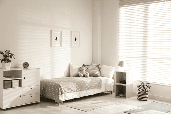 A beautifully designed child's bedroom featuring Dubai Blinds 2025 best and cheap Roman blinds, adding elegance, warmth, and privacy.