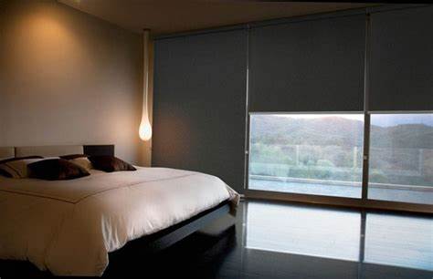 Modern bedroom featuring top-rated blackout blinds 2025, ensuring a peaceful sleep with custom, affordable light control in Dubai.
