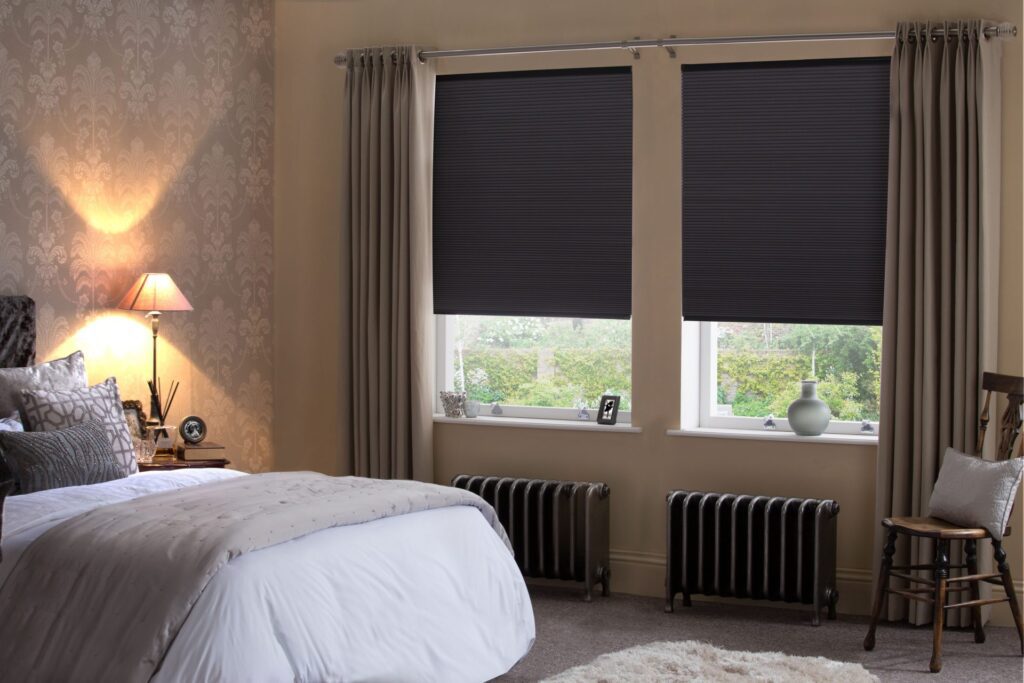 Top-rated sleep blackout blinds 2025 in a cozy bedroom, offering a cheap and affordable custom window solution in Dubai for complete darkness.