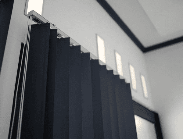 Close-up of sleek recycled vertical blinds in a modern Dubai home, offering a stylish, elegant, and eco-friendly window solution.