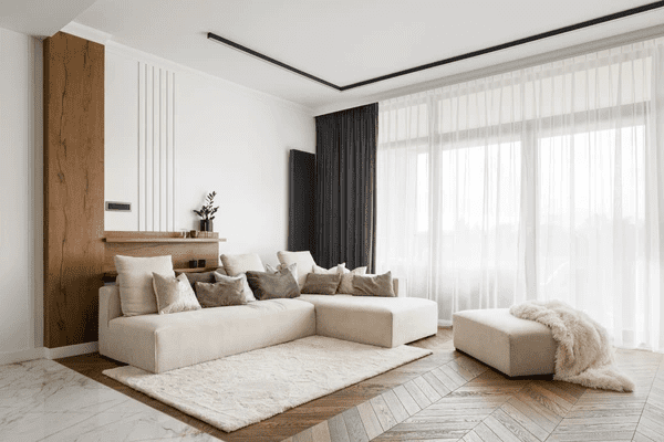 Modern living room with heat-resistant curtains, creating a sleek and cozy atmosphere