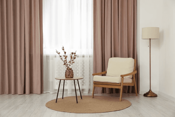 Cozy corner with heat-resistant curtains, creating a warm and inviting atmosphere.
