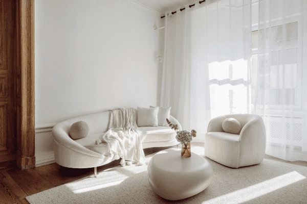 Sleek living room with heat-resistant curtains, enhancing modern design and functionality.