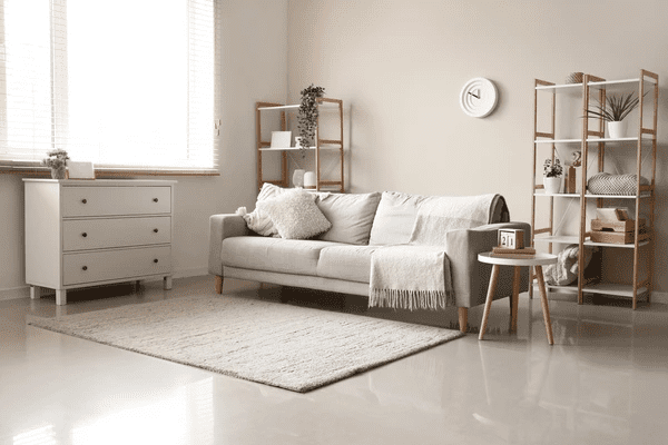 Minimalist living room with elegant white blinds, stylish furniture, and cozy home decor in Dubai 2025.
