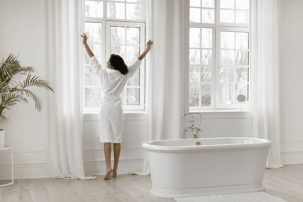 Modern bathroom with thermal curtains that provide superior heat insulation and a serene atmosphere.