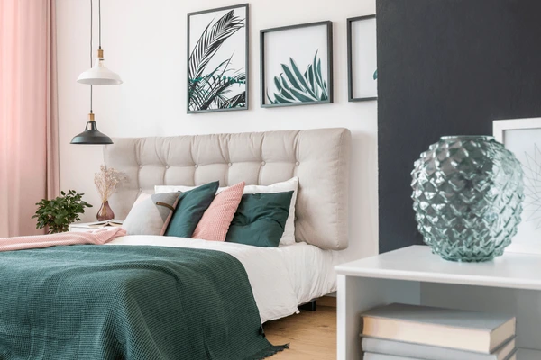 Elegant sheer curtains for pink walls in a modern Dubai bedroom with green and blush accents 2025.